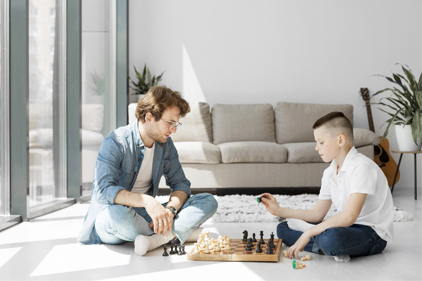 Boy learning chess